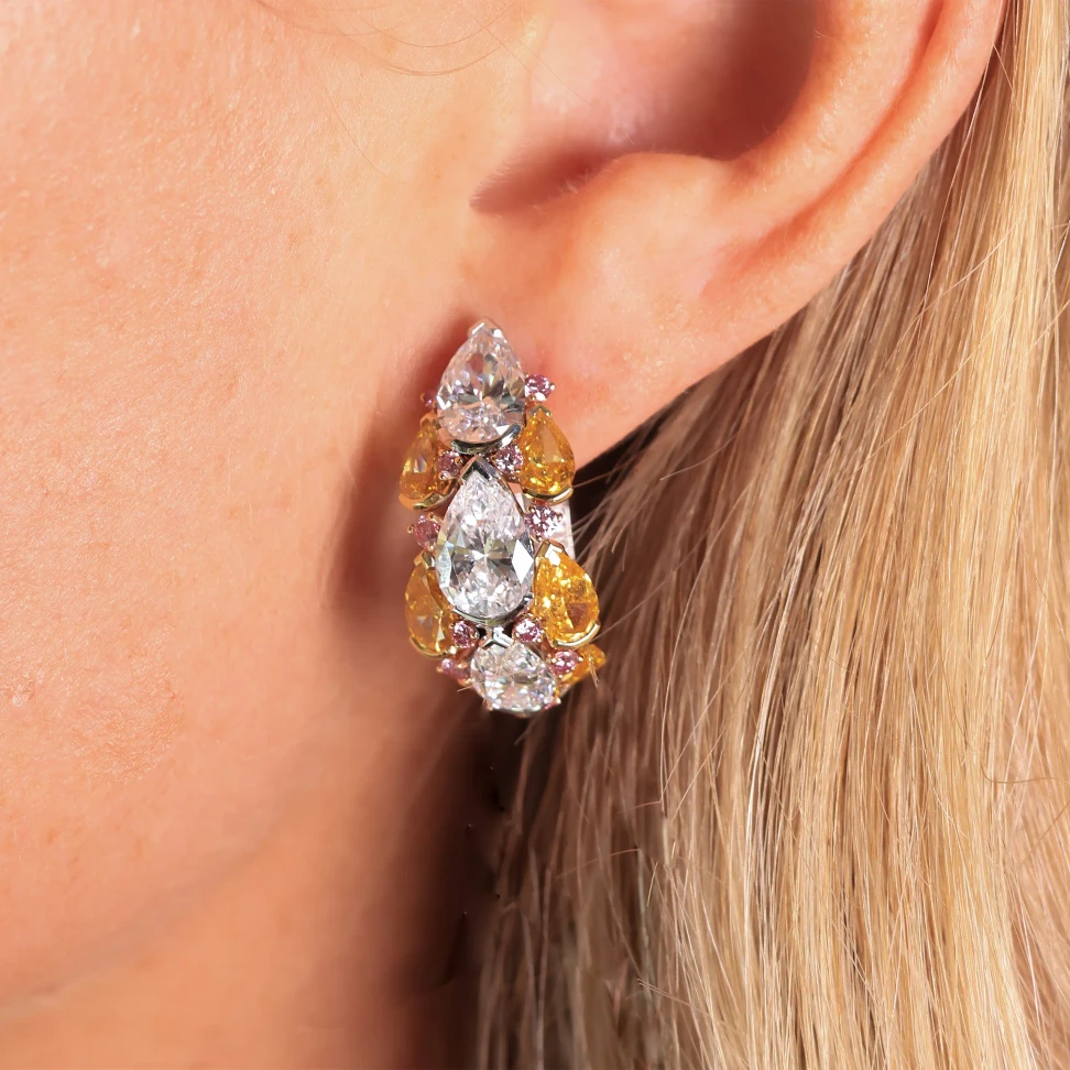 The Samsara earrings feature 6.69 carats of pear-shaped white diamonds, 5.41 carats of fancy orangey yellow diamonds and 0.84 carats of fancy pink diamonds