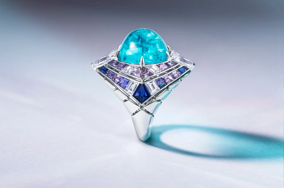 David Morris sets the tone for Legacy of Colour Volume II with the Tetra ring, pairing electric Paraiba blue with a spectrum of violet and blue sapphires