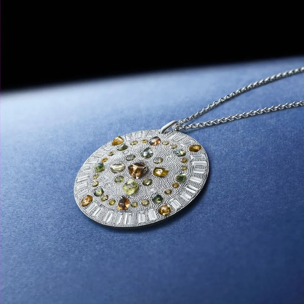 <p>De Beers Talisman collection pendants with rough diamonds</p>