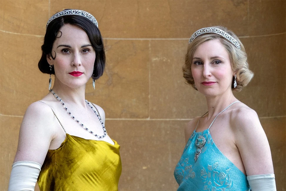 <p>Michelle Dockery stars as Lady Mary and Laura Carmichael as Lady Edith in DOWNTON ABBEY: The Grand Finale. Credit: Rory Mulvey / © 2025 FOCUS FEATURES LLC</p>