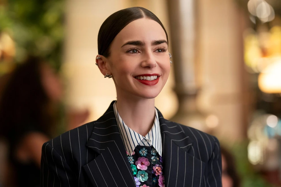 <p>Lily Collins as Emily Cooper in season 5 wearing ear climbers and cuffs. Her jewellery choices have become more stylish and adventurous with each new season</p>
