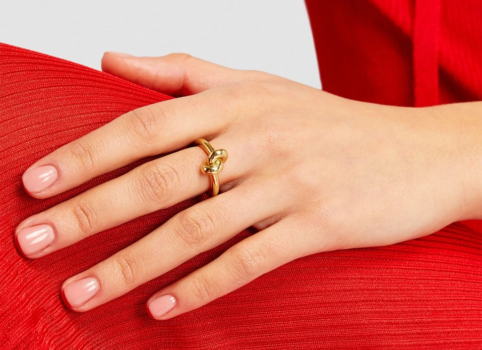 <p>Absolutely Tight knot ring in 18K yellow gold by the Swedish jewelley house Engelbert.</p>