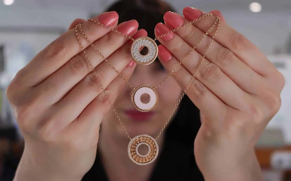 <p>Ferrat Paris necklaces from top to bottom: the Paris necklace with diamonds; the Don’t Take Me For Granted necklace with pink lacquer, and the Triomphe Double Round necklace with diamonds, all in rose gold</p>