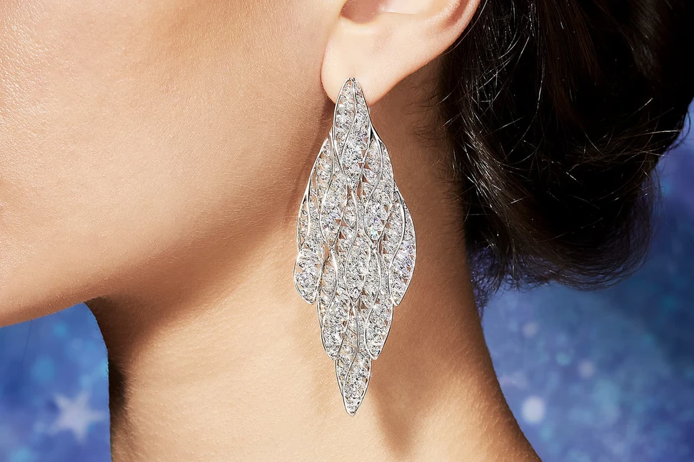 <p>FORMS ‘Helix’ earrings with marquise diamonds in white gold</p>