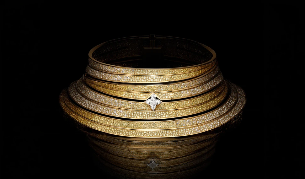 <p>The Fortune high collar necklace, set with 4,700 pavé diamonds in majestic rows graduating from Fancy Vivid orange to yellow to white</p>

