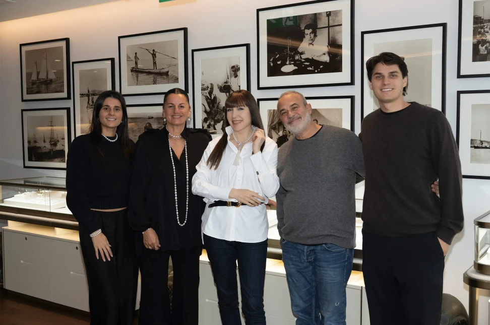 Katerina with the Autore family, including founder Rosario Autore (second from right)