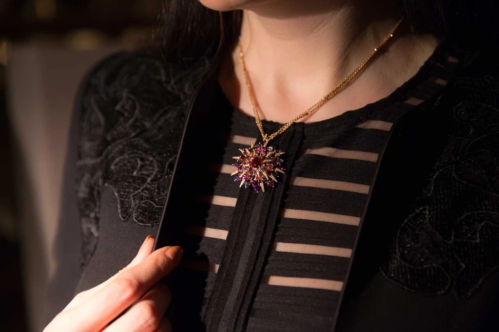 <p>Gübelin ‘Red Dahlia’ transformable pendant necklace with oval cut 2.18ct Burmese ruby, trillion cut sapphires and brilliant cut diamonds</p>