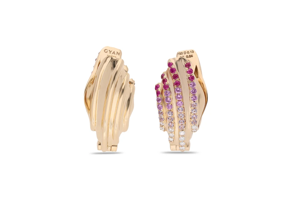 <p>Gyan Jaipur reversible Shell earrings from the Yami collection with pink sapphires and diamonds in 18k yellow gold </p>
