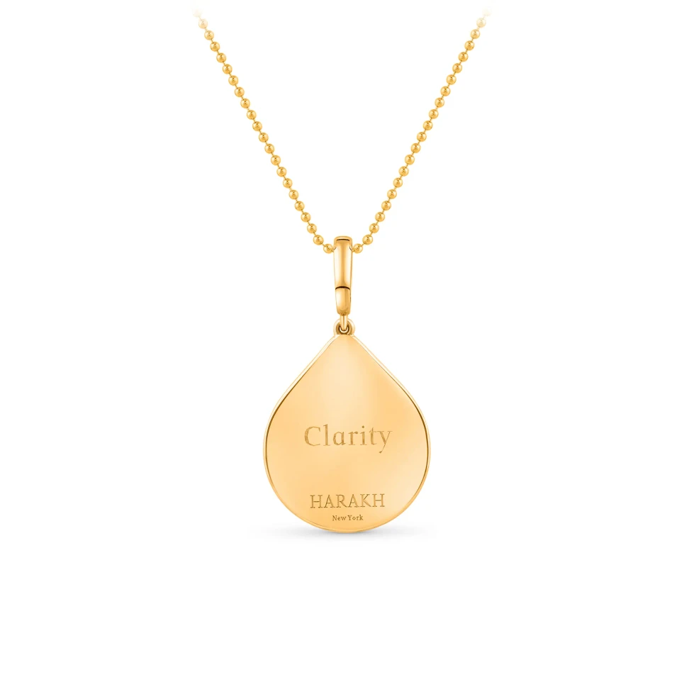 The reverse side of the HARAKH Drops of Joy Clarity pendant with diamonds in 18k yellow gold