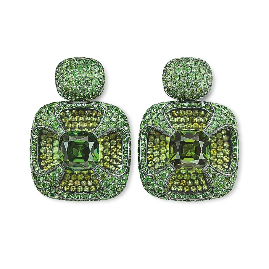 <p>Hemmerle earrings – tourmalines, demantoid garnets, silver, white gold</p>
