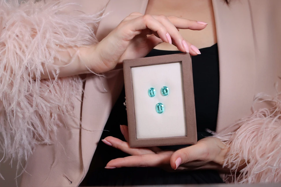 <p>A trio of oval-shaped Paraiba tourmaline gemstones, colour matches by Brasil Gem Commerce</p>