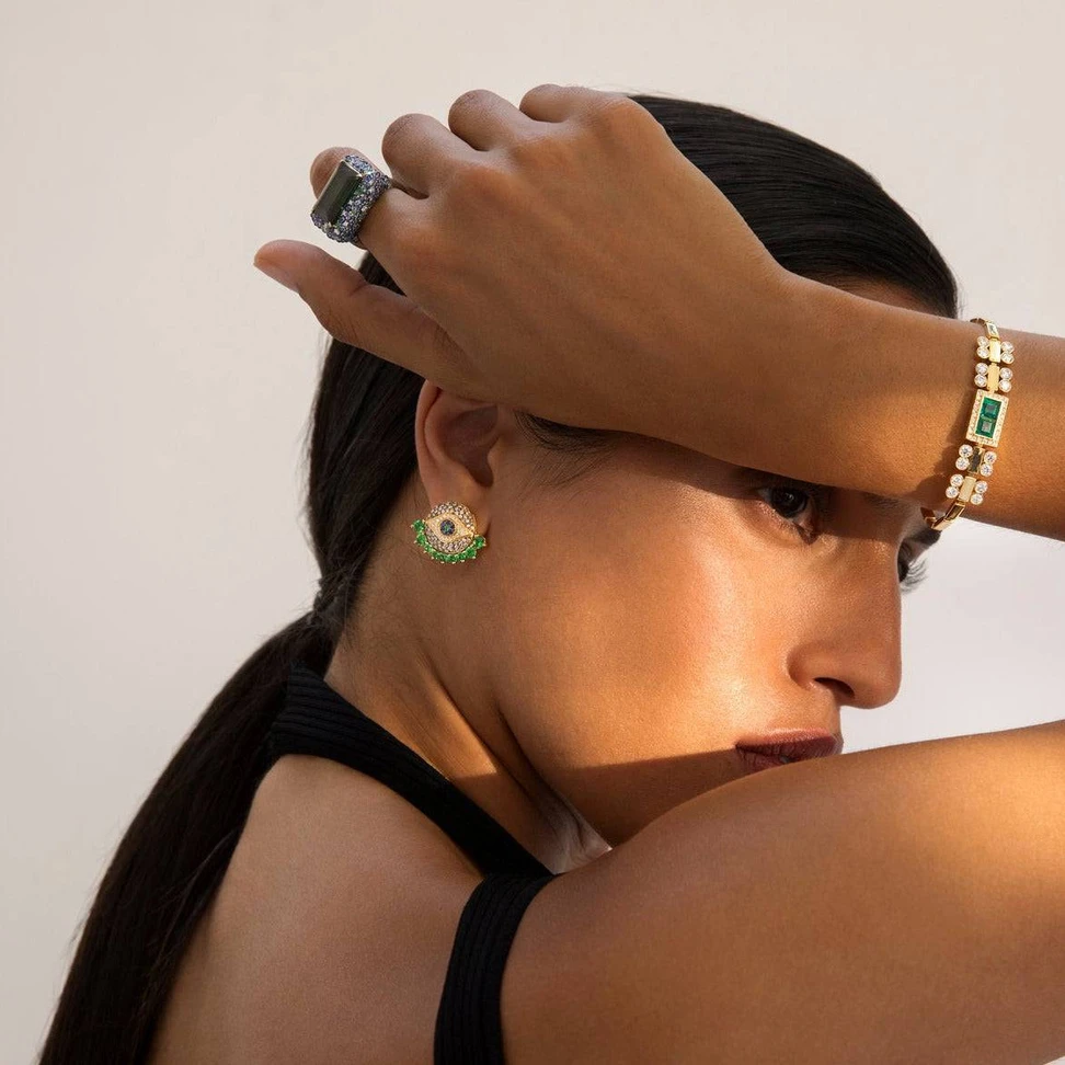 <p>These exquisite Ileana Makri Dawn Studs are handcrafted from luxurious 18K Rose Gold, set with shimmering Champagne and White Diamonds and radiant Blue Sapphires</p>