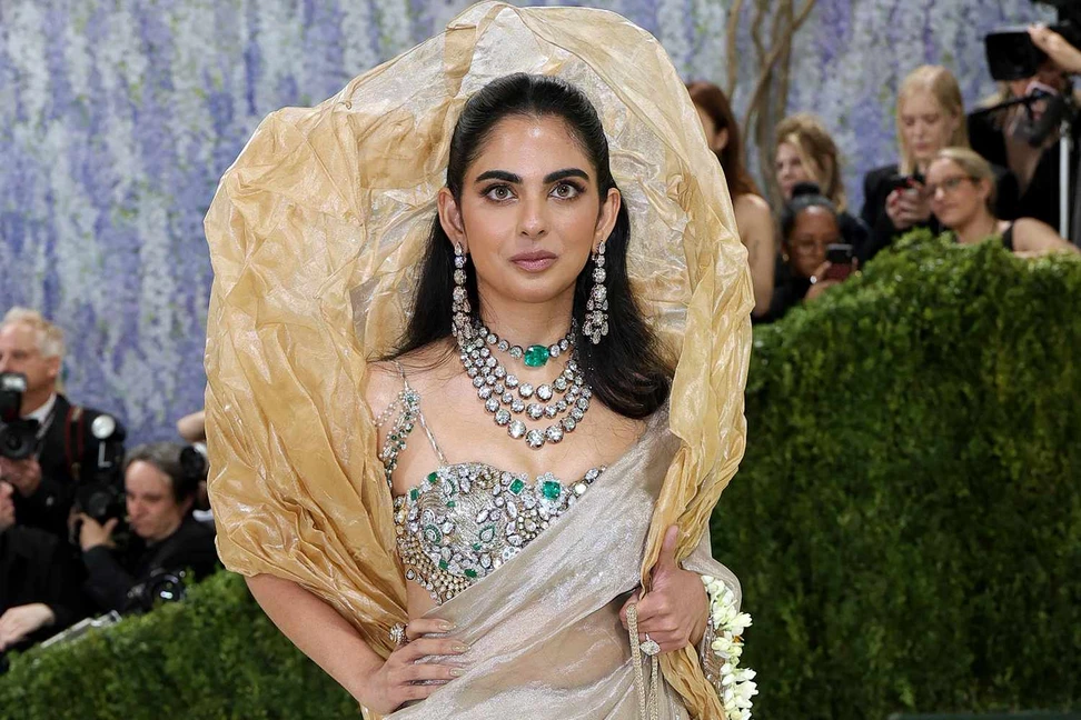 <p>Indian businesswoman Isha Ambani arrived wearing pieces from her mother Nita Ambani’s collection, including a heavily encrusted blouse crafted almost entirely from gemstones</p>
