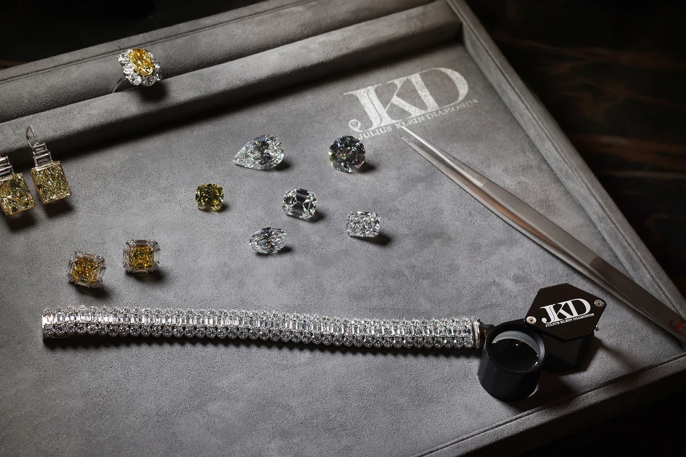 <p>An array of loose diamonds and high jewellery on display at Julius Klein</p>
