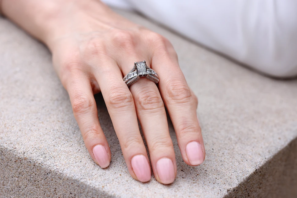 Katerina Perez and Amit Bhansali, founder of Chromia_Chromia New York 2.15ct emerald cut colour-change Oregon garnet ring with diamonds in 18k white gold