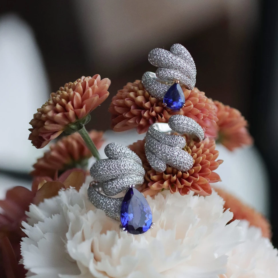 <p>Lumen of Grace earrings and ring <span class="TextRun BCX0 SCXP254411066" lang="EN-US" xml:lang="EN-US" data-scheme-color="@000000,," data-usefontface="true" data-contrast="none"><span class="NormalTextRun BCX0 SCXP254411066"><span class="TextRun SCXP263013176 BCX0" lang="EN-US" xml:lang="EN-US" data-scheme-color="@000000,," data-usefontface="true" data-contrast="none"><span class="NormalTextRun SCXP263013176 BCX0">from <span class="TextRun BCX0 SCXP163336872" lang="EN-US" xml:lang="EN-US" data-scheme-color="@000000,," data-usefontface="true" data-contrast="none"><span class="NormalTextRun BCX0 SCXP163336872">Youngsun Nam&#8217;s</span></span> Inner Garden </span></span><span class="TextRun SCXP263013176 BCX0" lang="EN-US" xml:lang="EN-US" data-scheme-color="@000000,," data-usefontface="true" data-contrast="none"><span class="NormalTextRun SCXP263013176 BCX0">Collection</span></span><span class="TextRun SCXP263013176 BCX0" lang="EN-US" xml:lang="EN-US" data-scheme-color="@000000,," data-usefontface="true" data-contrast="none"><span class="NormalTextRun SCXP263013176 BCX0">​ with diamonds in 18k white gold. The earrings feature 3 carats of pear shape tanzanites</span></span></span></span></p>
