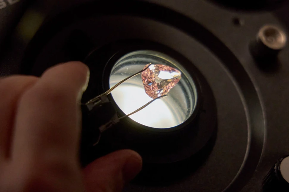 The Grand Conté pink diamond being examined by a gemmologist