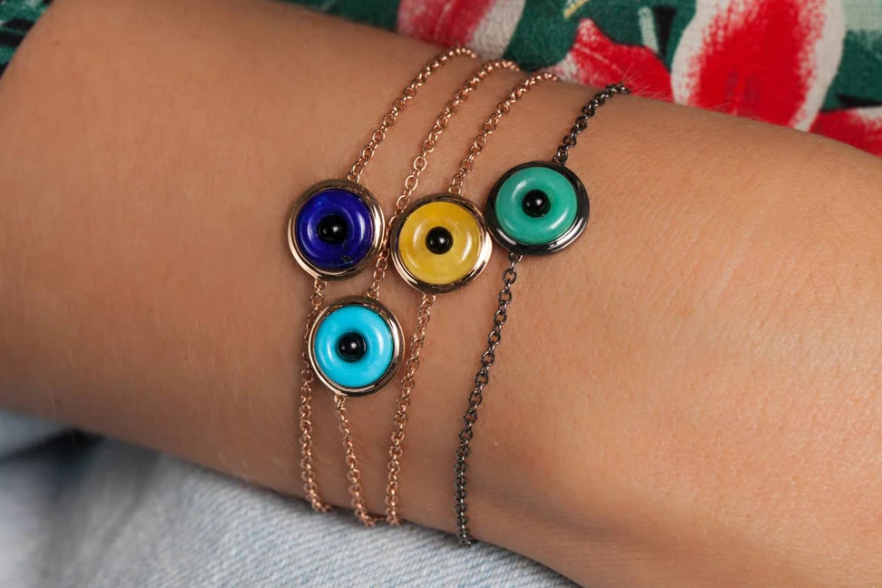 <p>Lily Gabriela Evil Eye bracelets in gold, lapis lazuli, turquoise and jade</p>