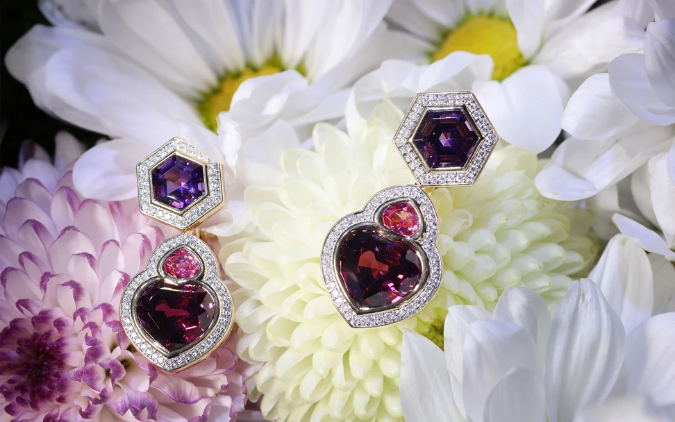 <p>Marina B Papira high jewellery earrings, set with two heart shape rhodolites totalling 14.05ct, 3.63ct hexagonal amethysts and 1.20ct pink spinels in 18k yellow gold </p>
