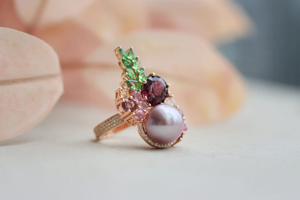 <p>Mariyeh Ghelichkhani Pink Serenade ring with a pink pearl, marquise-cut tsavorite, oval-shaped spinel and sapphires </p>
