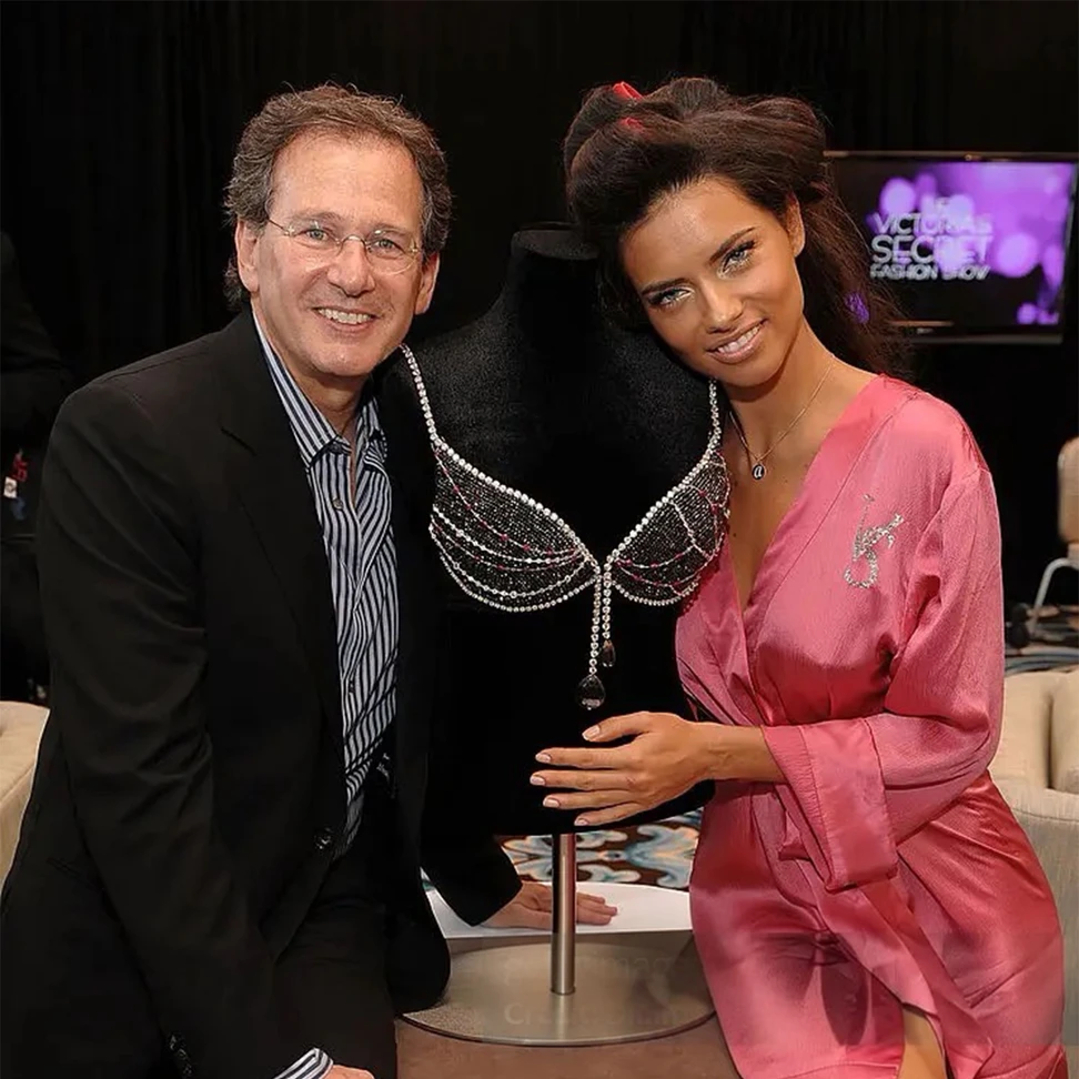 Martin Katz with model Adriana Lima and the Black Diamond Fantasy Miracle Bra, featuring thousands of black diamonds and valued at $5 million