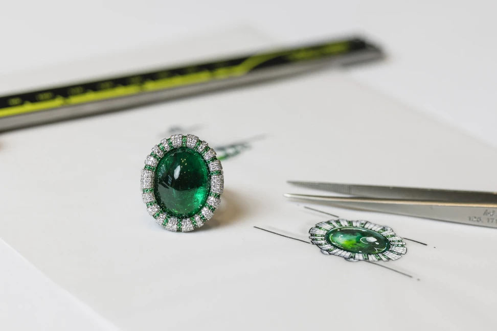 <p>Martin Katz ring with a 16-carat oval-shaped emerald cabochon, micro-set with 629 diamonds and 90 emeralds in 18k white gold ©martinkatzjewels</p>

