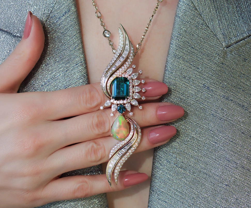 <p>Mergin Jewelry by Mehragin Rahmati necklace with diamonds, green tourmaline and precious opal</p>
