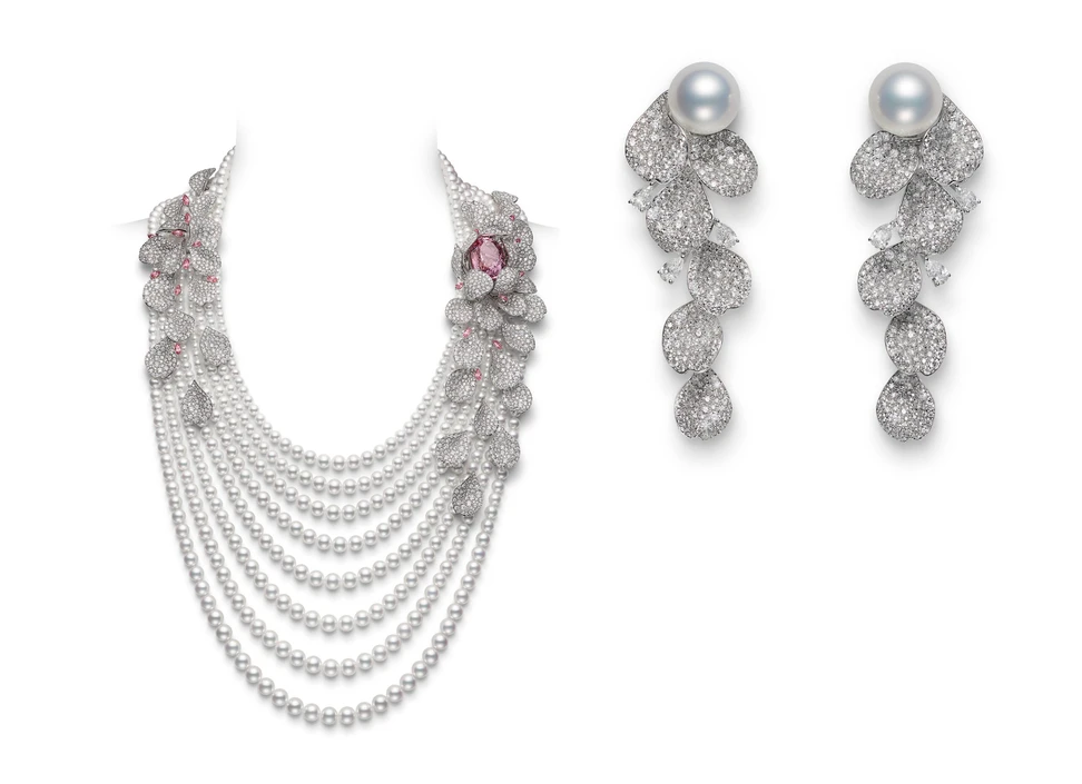 <p>An Akoya cultured pearl necklace with a 32.35-carat morganite, 5.07 carats of tourmaline and 63.13 carats of diamond alongside a pair of white South Sea cultured pearl and diamond earrings, both in 18k white gold, part of the Mikimoto Les Pétales High Jewellery collection</p>