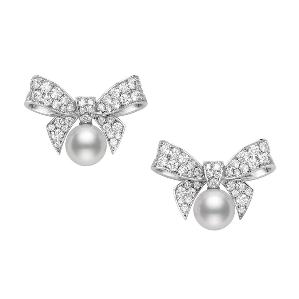 Diamond set ribbon motifs bring a whimsical touch to the collection, pairing Mikimoto’s signature pearls with a more playful sense of femininity.