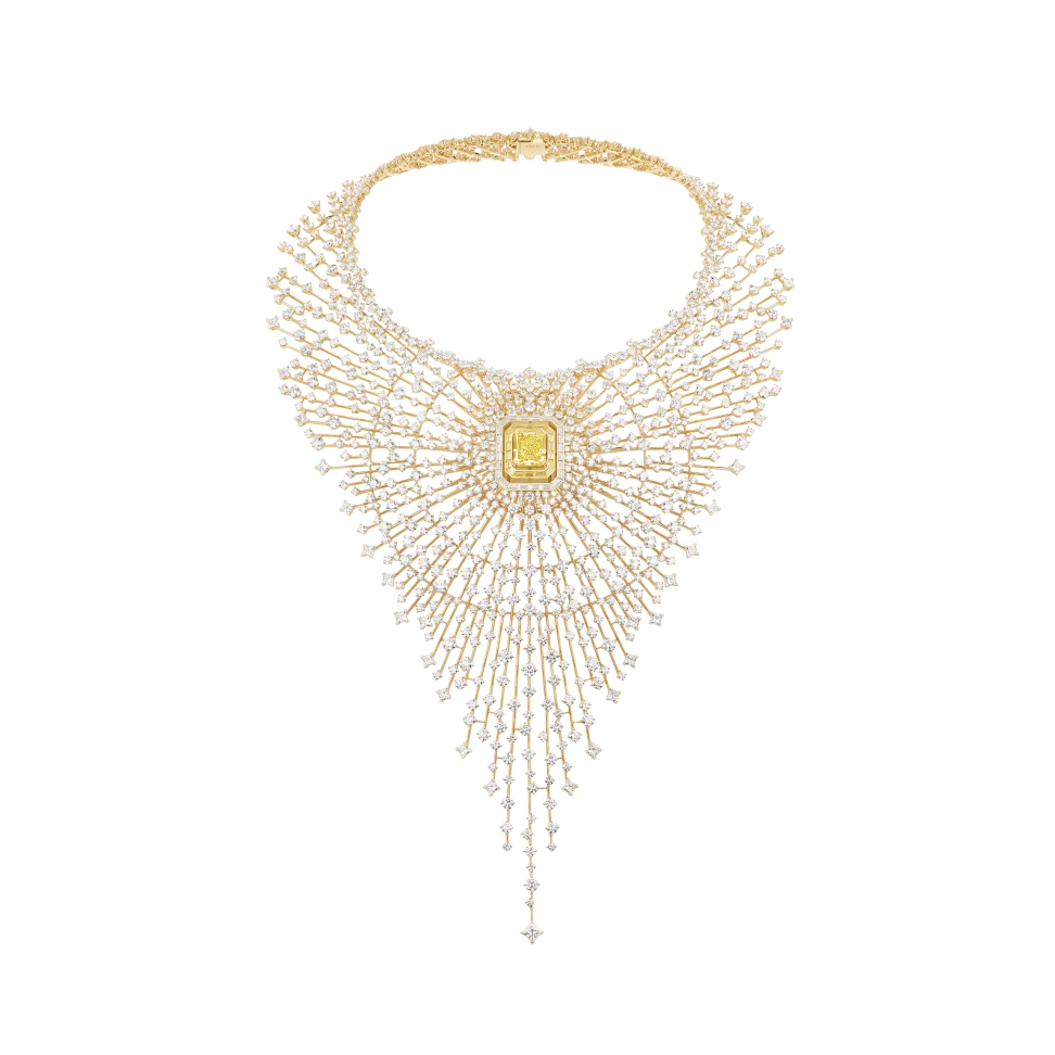 Maison FRED's joyful sunburst-style Soleil d’Or bib necklace, set with more than a thousand white diamonds, totalling 125 carats, that emanate from a beating yellow diamond heart
