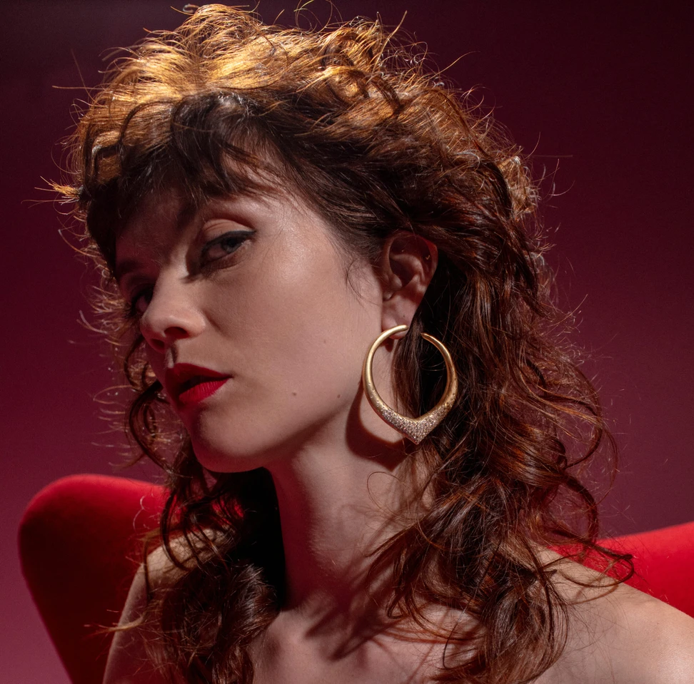 <p>Nada Ghazal Arch Power large hoop earrings with champagne diamonds in 18k yellow gold</p>