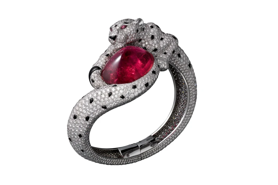 <p>Panthere de Cartier bracelet – platinum, rubellite, pink sapphires, onyx, diamonds</p>