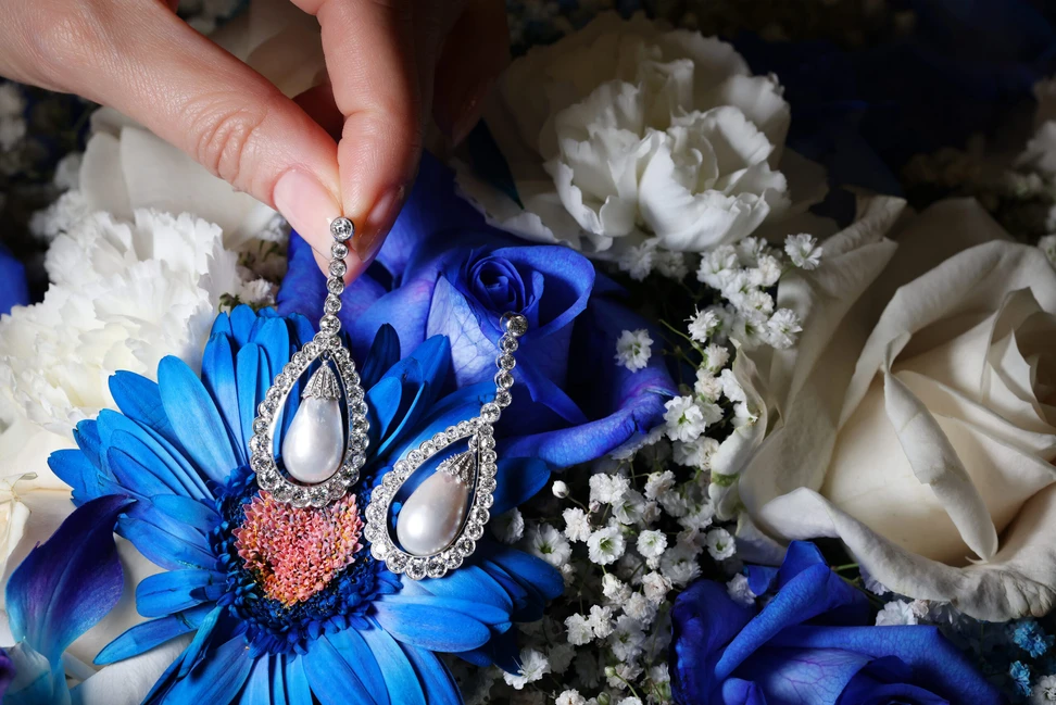 <p>A pair of Pearl Biography earrings showcasing matching drop-shaped natural Bahraini pearls – a rarity Ahmed speaks about with reverence.. “Sometimes you find one perfect pearl, and then you wait years to find its match”</p>
