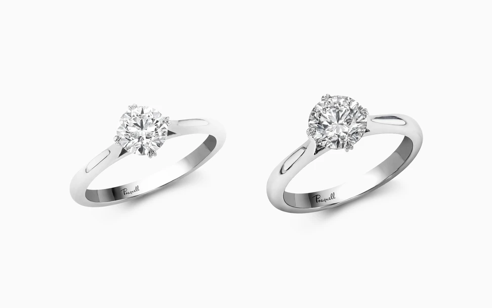 <p>Pragnell Windsor engagement rings, one set with a 0.90 carat round diamond, the other a 1.01 carat centre stone</p>
