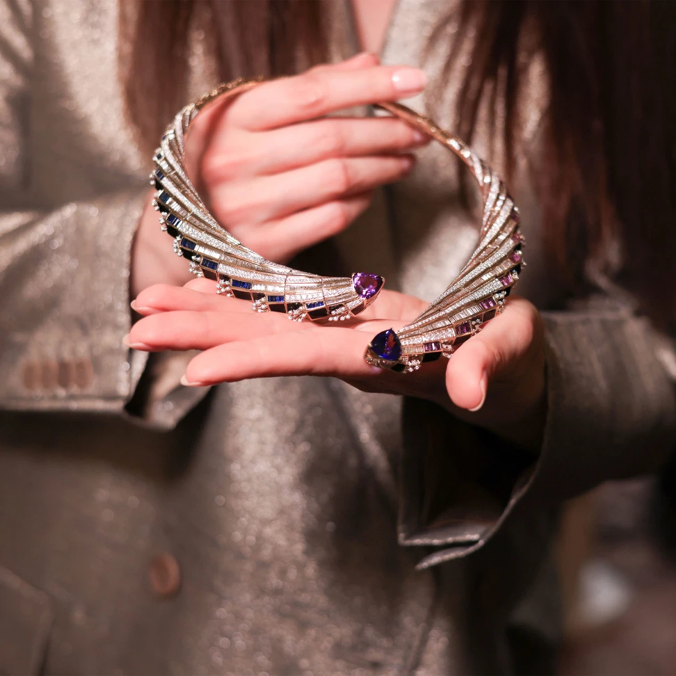 Katerina was invited to go behind the scenes and try the jewels on before the catwalk show