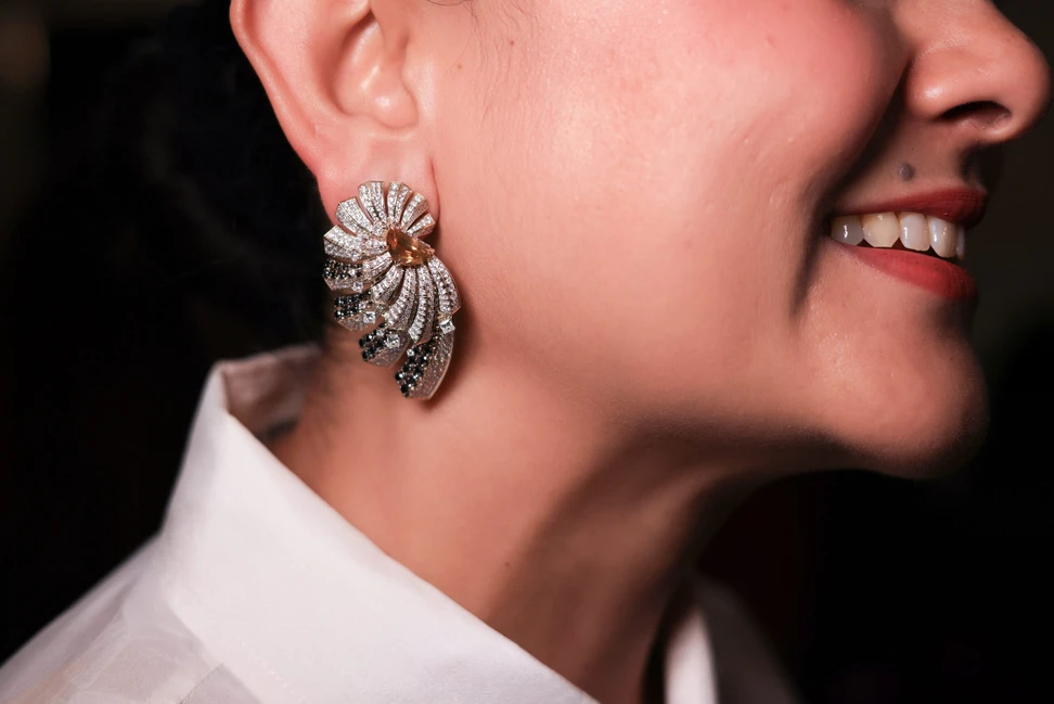 Citrine, white diamond and black diamond high jewellery earrings, inspired by the graphic and architectural language of Rahul Mishra’s couture
