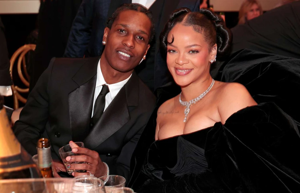 <p>Rihanna at the Golden Globe Awards wearing a pear-shaped diamond stud from REZA, a diamond ear climber, Cartier diamond-set earrings and a Cartier Sixième Sens High Jewellery necklace</p>