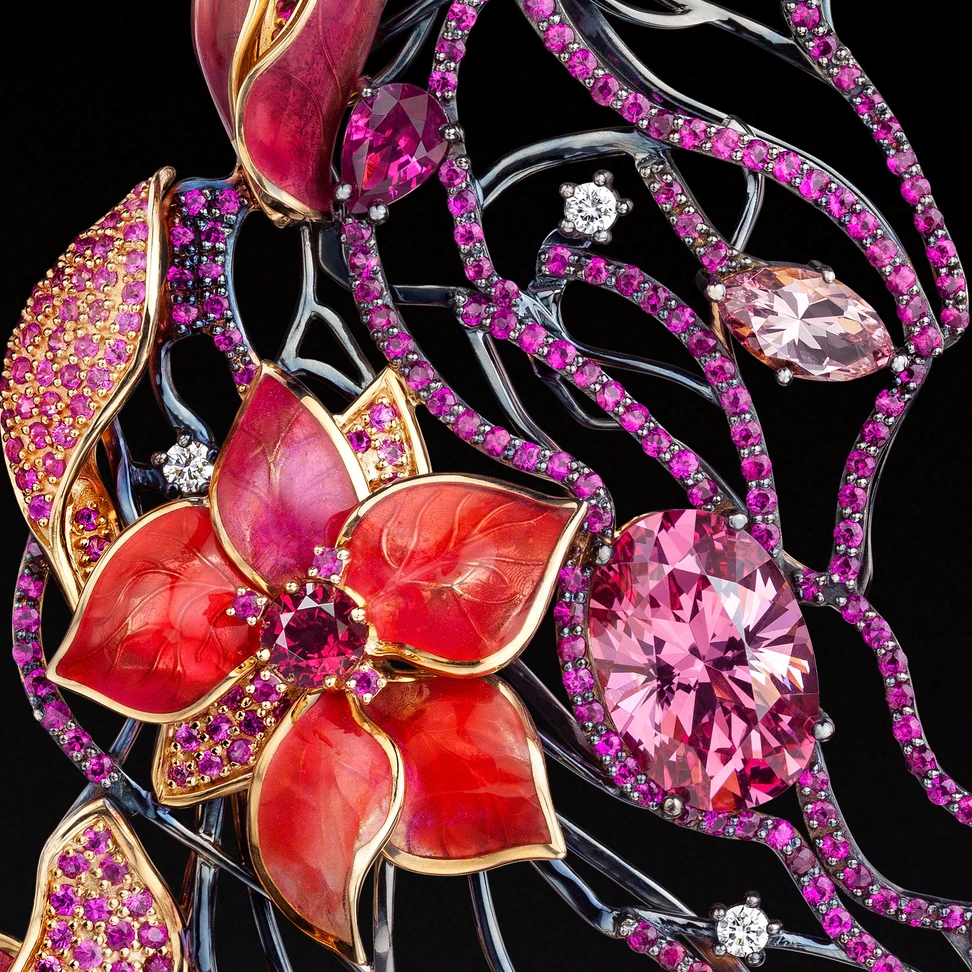 <p>A closer look at the translucent enamel in the IDORO Sakura – Wind in the Garden brooch, which is used alongside Burmese rubies, pink sapphires, morganite and diamonds</p>
