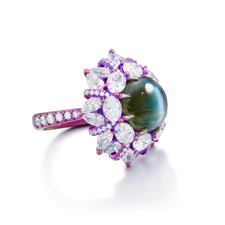 <p>Sotheby’s Cat’s Eye Alexandrite and Diamond Ring. Set with cabochon cat’s eye alexandrite weighing 9.36 carat, decorated with oval diamonds, pear-shaped diamonds and brilliant-cut diamonds, mounted in titanium</p>