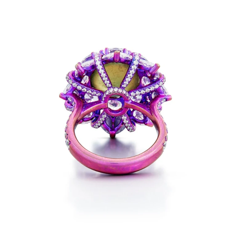 <p>Sotheby’s Cat’s Eye Alexandrite and Diamond Ring. Set with cabochon cat’s eye alexandrite weighing 9.36 carat, decorated with oval diamonds, pear-shaped diamonds and brilliant-cut diamonds, mounted in titanium</p>