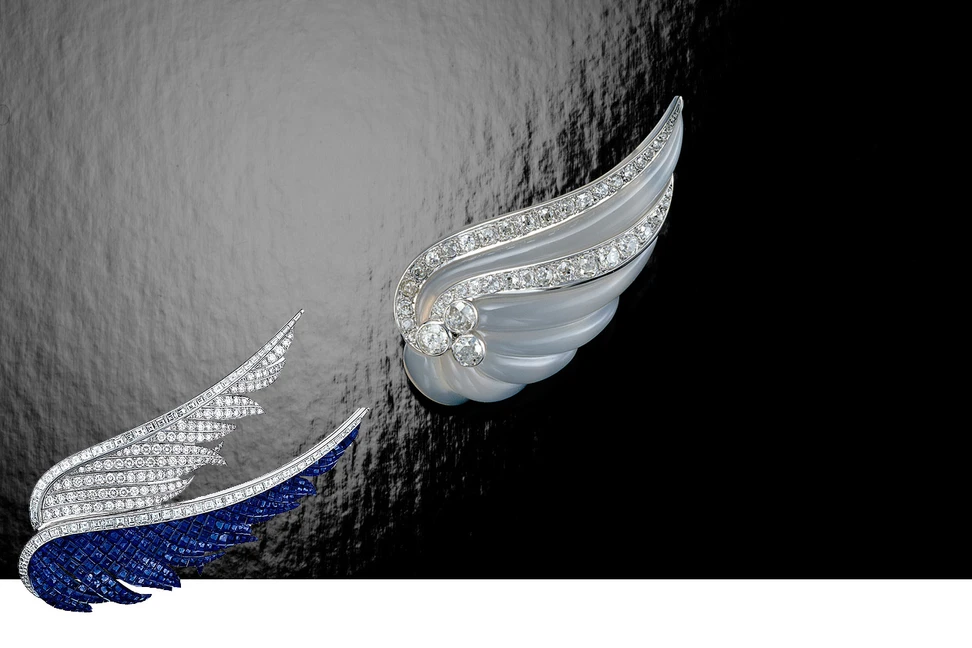 <p>Suzanne Belperron carved brooch with diamonds and Van Cleef&amp;Arpels diamond and sapphire brooch</p>
