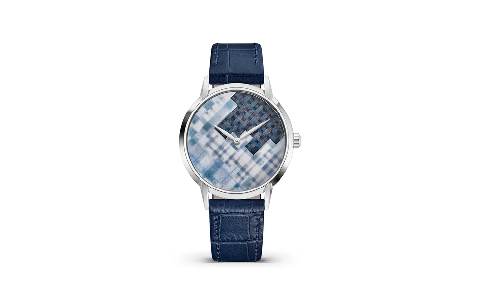 <p>TAOS Savile Row timepiece with tartan-inspired engraving, multi-layered enamel, miniature painting, and the fondant technique to create a dimensional woven appearance </p>
