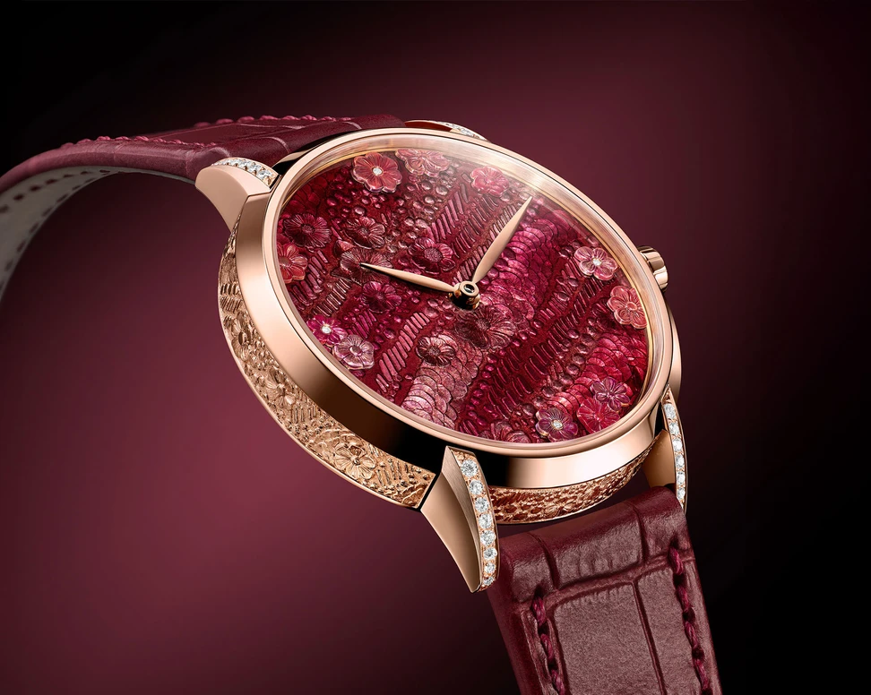 <p>TAOS Sequins timepiece with a raised hand-engraved dial, translucent enamelling, and sculpted reliefs in the shape of flowers </p>
