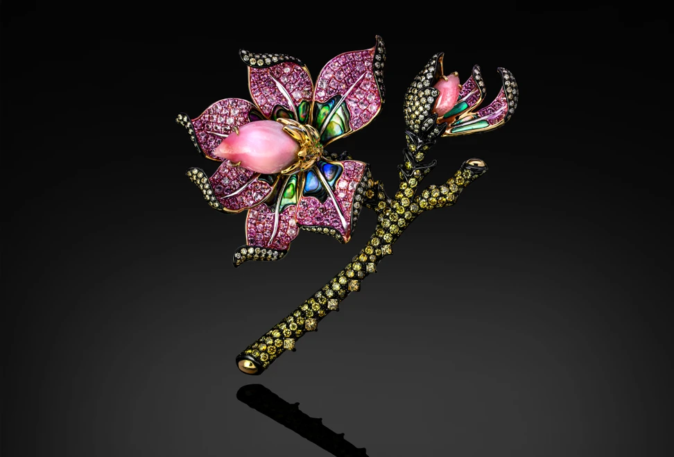 <p>Austy Lee The Pink Fragrance of Magnolia brooch from The Exoskeleton of Venus Collection with Caribbean conch pearls, abalone shell, pink sapphires, and diamonds</p>