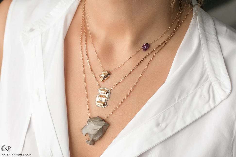 <p>VMAR gold and titanium pendants</p>