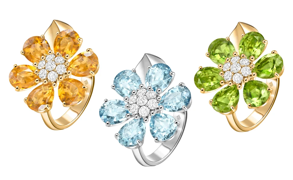 <p>Van Cleef & Arpels Fleurs d’Hawaï rings, featuring citrine, aquamarine, and peridot, set with diamonds in 18k yellow and white gold</p>