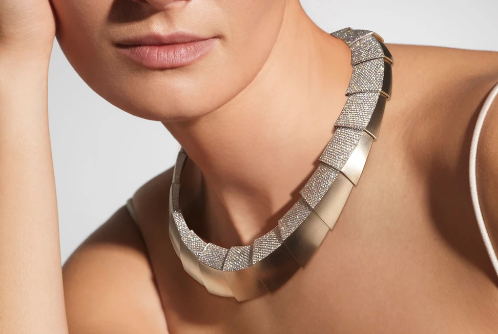 <p>A model wears the Vhernier Profilo Del Vento necklace from the Ardis High Jewellery collection with 2,695 diamonds weighing 19.35 carats, set in matte 18k white gold</p>
