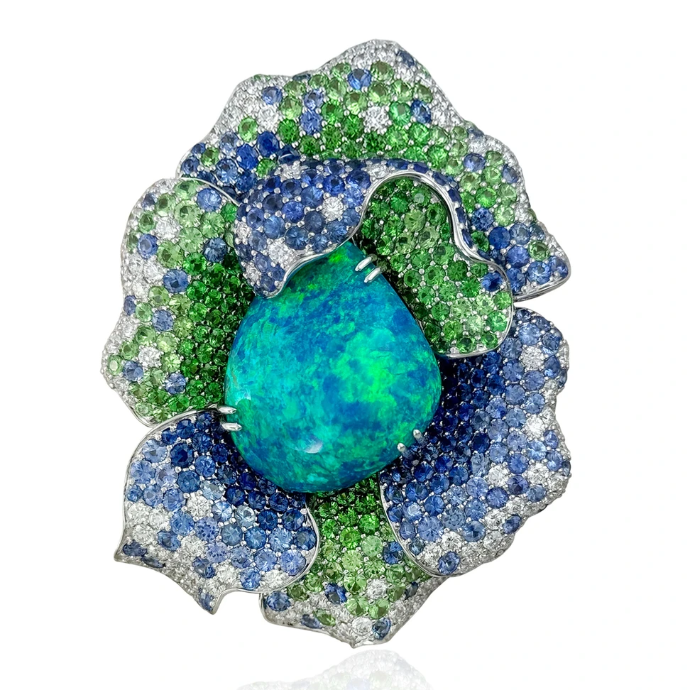 <p>Margot McKinney Rainforest Bloom ring in 18K white gold, set with a 37.52ct Australian black opal, diamonds, blue sapphires and tsavorites</p>
