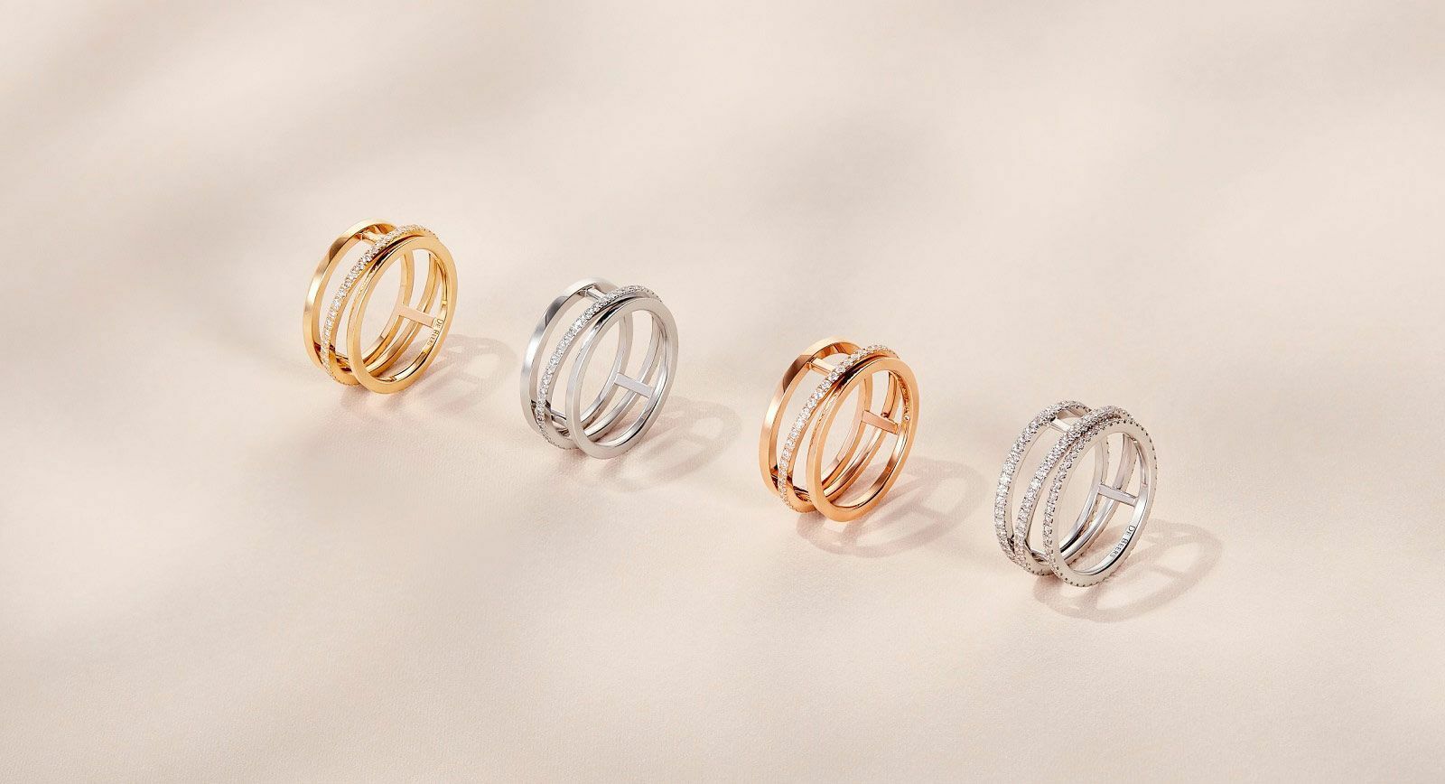 Кольца из белого, желтого и розового золота De Beers’ из коллекции ‘Horizon’