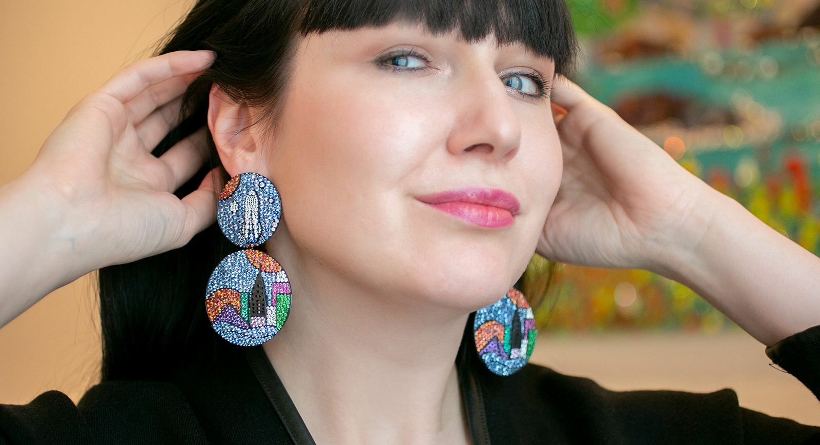 Katerina Perez wears the New York earrings by Antonio Seijo 